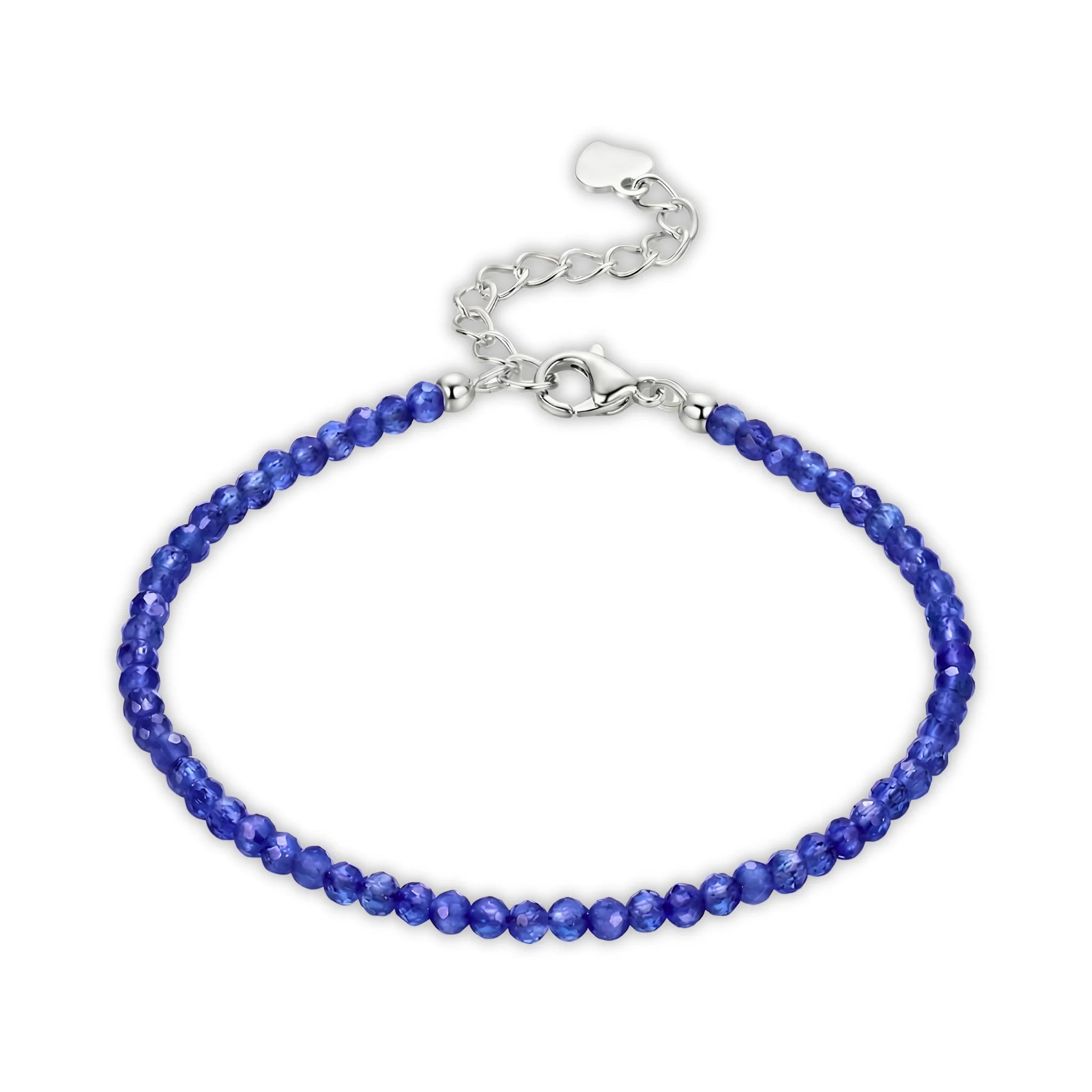 Essential silver bracelet featuring lapis lazuli gemstone beads with deep blue tones.
