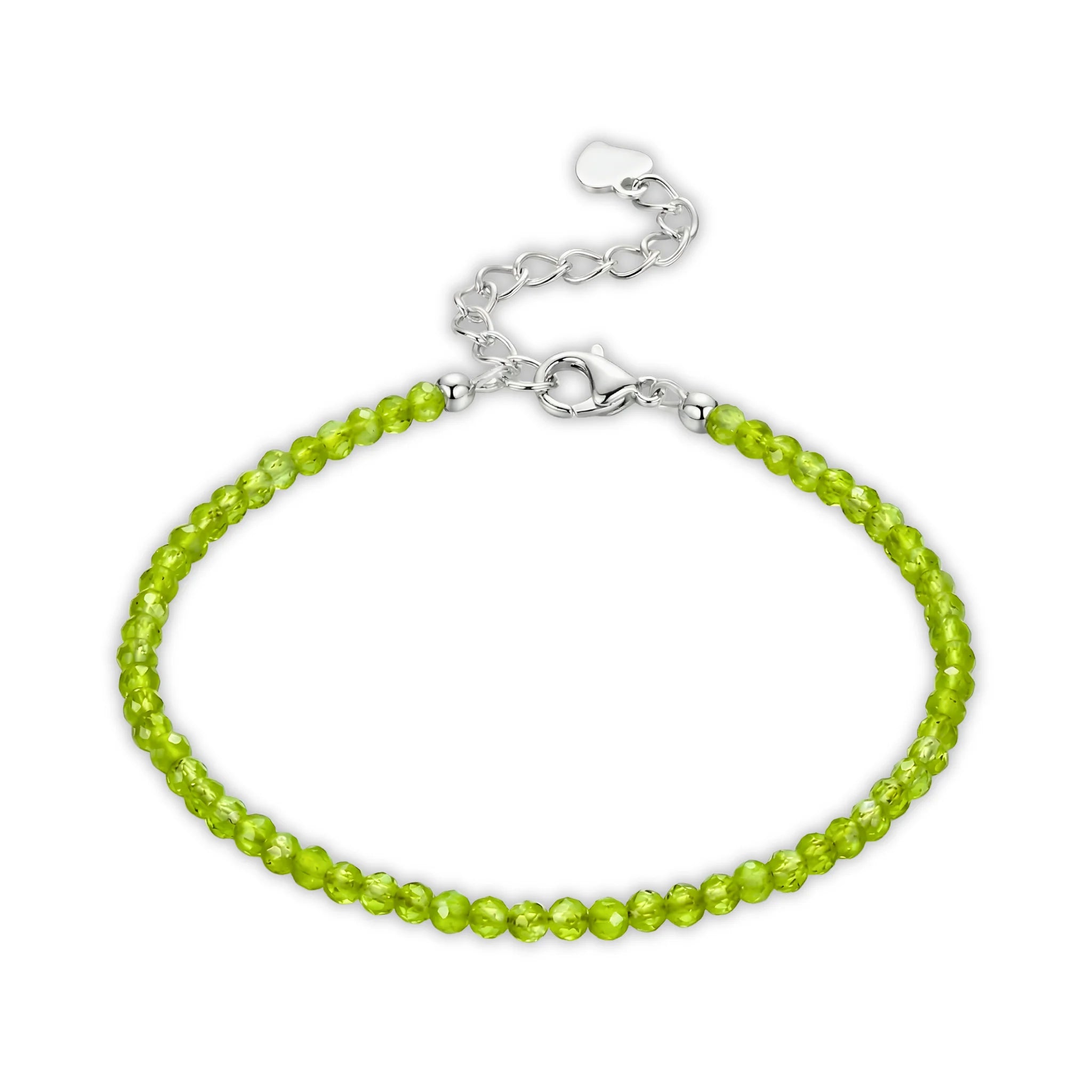 Essential silver bracelet made with peridot gemstone beads for a fresh, light green accent.