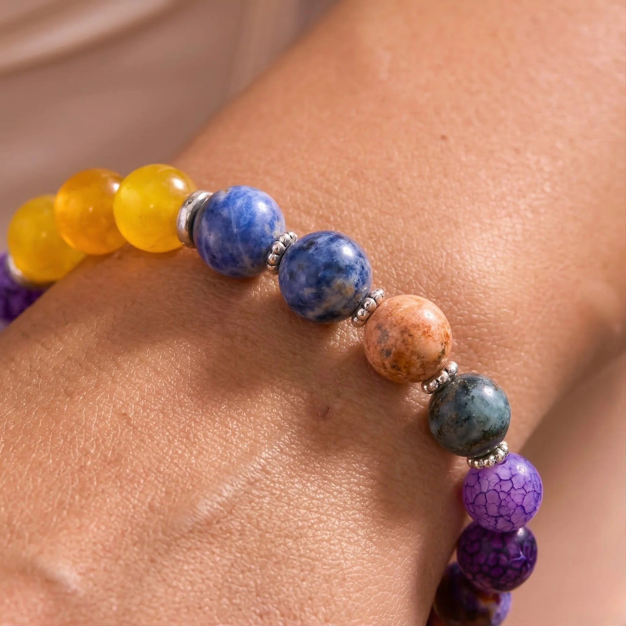 Multicolored beaded bracelet on a wrist